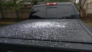 Dave's truck bed cover is covered in white confetti